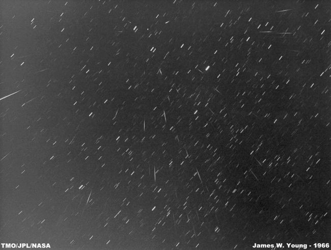 1966 Leonid meteors, showing the radiant effect that was discoveres 133 years ago, during the 1833 Leonid meteor storm. Picture by James W. Young from Table Mountain, California.