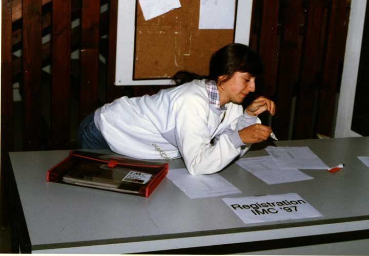 Lina Rashkova at the registration desk (credit unkown photographer, image provided by Valentin Velkov).