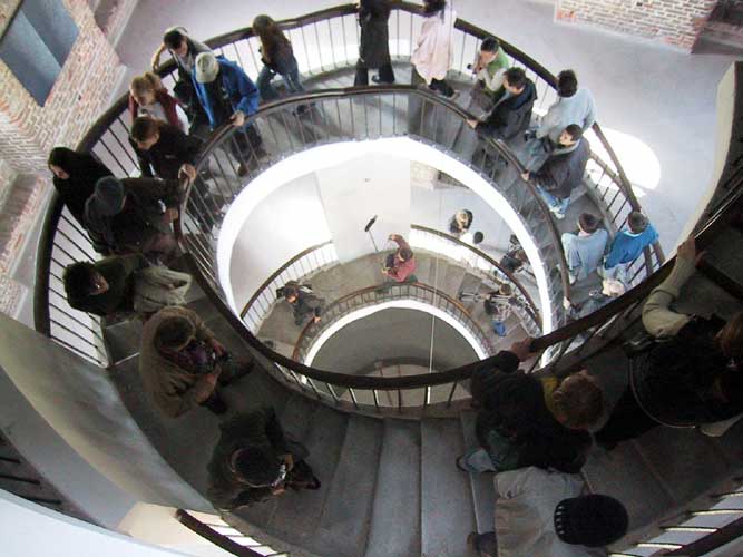 During the excursion, climbing the stairs in the tower with the pendule of Foucault (credit Casper ter Kuile).
