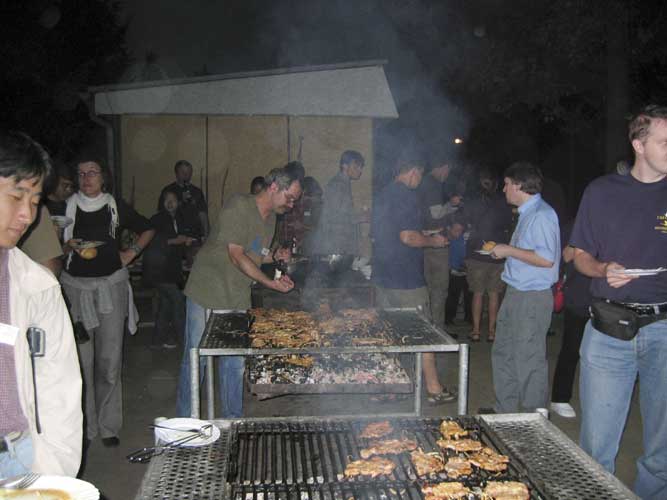 André Knöfel taking care about the barbecue (credit Casper ter Kuile).