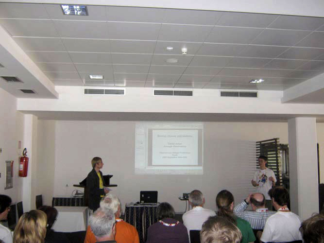 David Asher presenting 'Recent shower calculations' with session chairman Rainer Arlt at left (credit Damir Šegon).