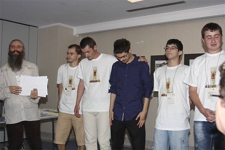 The Sunday noon: The end of the 30th IMC with the organizer Valentin Grigore awarding his SARM team with diploma's: from left to right Valentin Mocanu, ??, Alex Grigore, Florin Stancu and Razvan Claudiu Ciubotaru (credit Bernd Brinkmann).
