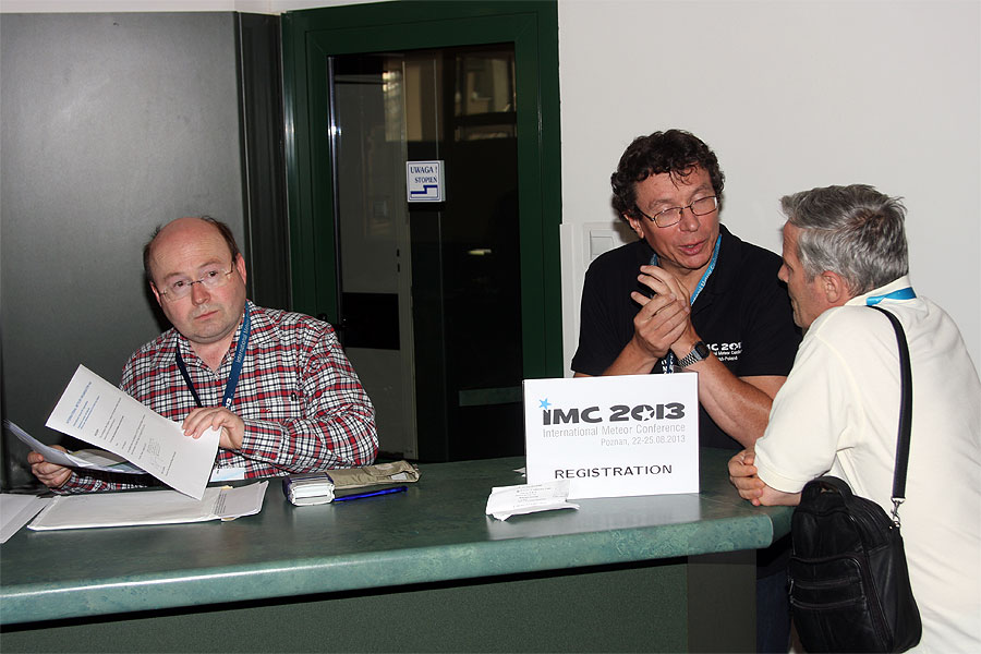 The 2013 IMC registration desk with IMO Treasurer Marc Gyssens, IMO IMC liaison officer Paul Roggemans and Damir Segon. (credit Bernd Klemt).