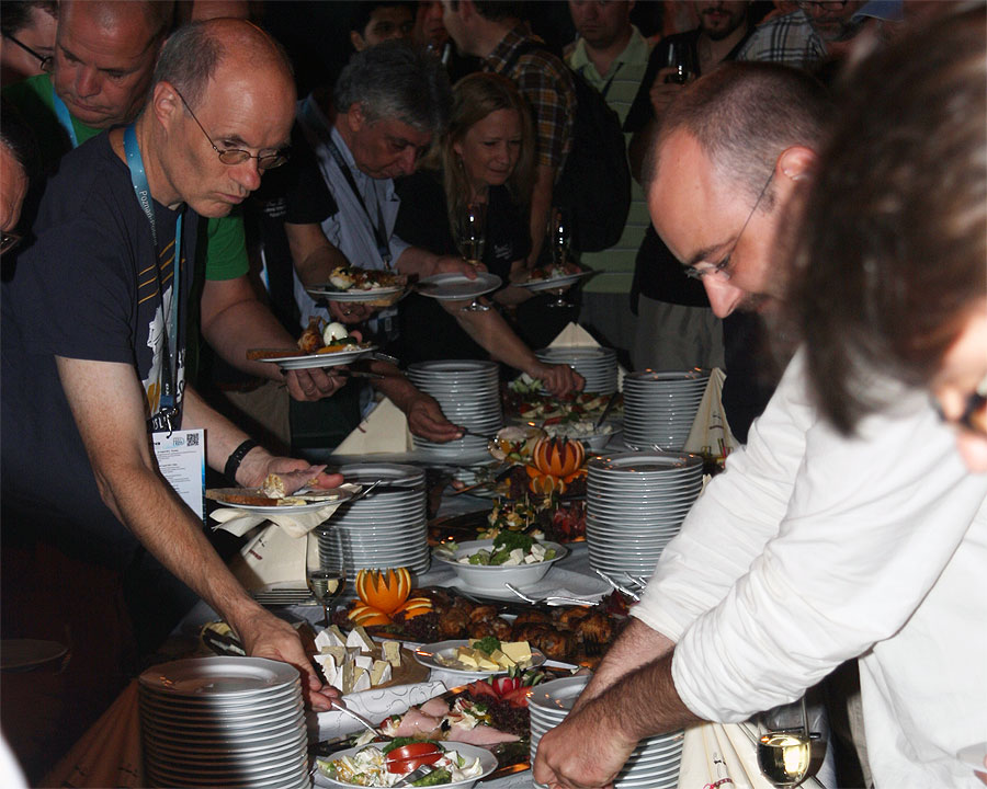 Back at the IMC host hungry participants 'attack' the buffet. From left to right we see Arnold Tukkers, Casper ter Kuile, Enrico Stomeo, Marina Bolis and Vincent Perlerin (credit Bernd Klemt).