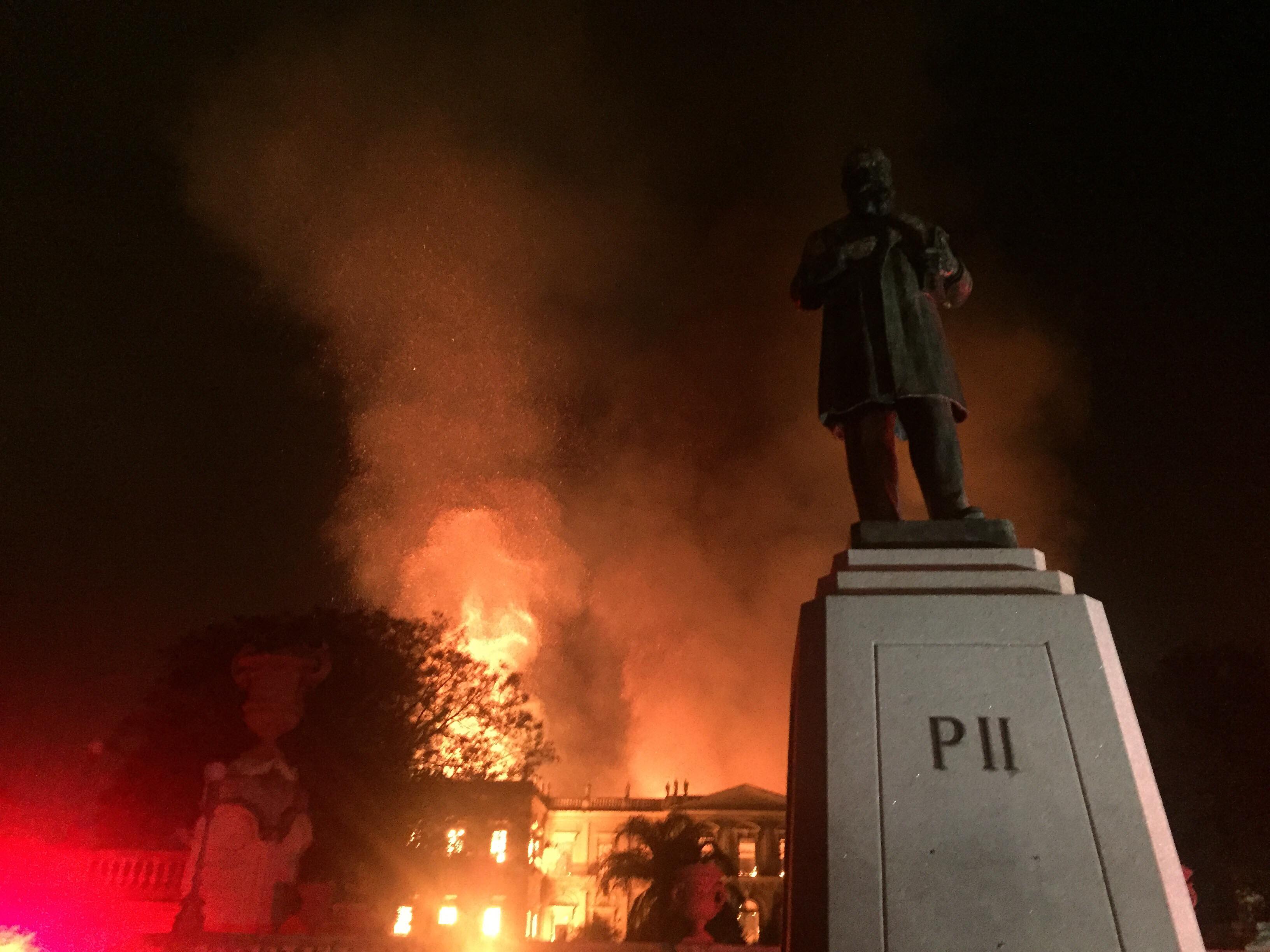 National Brazilian Museum under fire. By Felipe Milanez - Sent by the photographer -- OTRS-sent, CC BY-SA 4.0, https://commons.wikimedia.org/w/index.php?curid=72299257