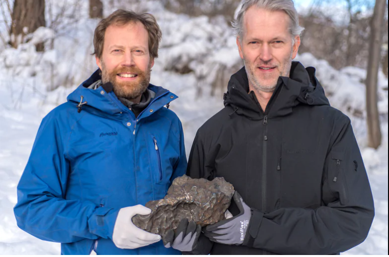 Andreas Forsberg and Anders Zetterqvist with the main meteorite fragment of the fireball observed on November 7, 2020, over Sweden. The first meteorite discovery in Sweden for 60 years! Credit: Andreas Forsberg/Anders