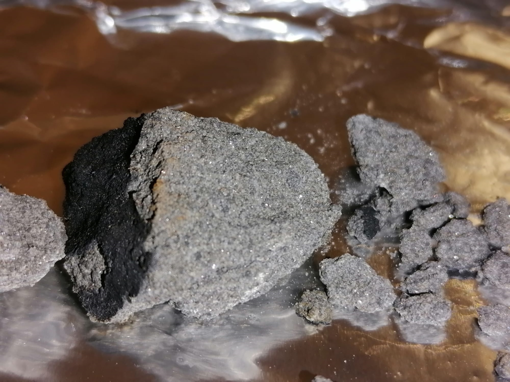 Figure 6- Pieces of meteorites recoveredd in Northern Matera, on a balcony. More than 70g of meteorites have been recovered in multiple fragments. Credit: PRISMA/INAF
